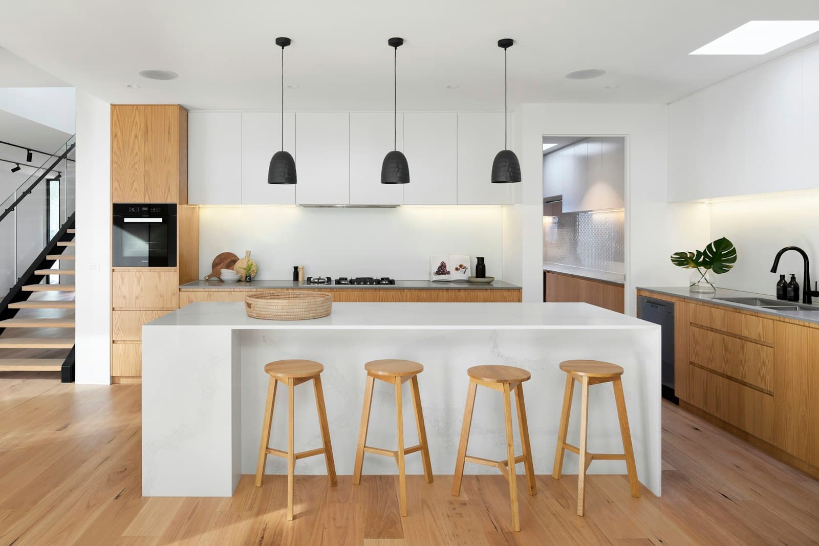 Bright renovated kitchen with island seating