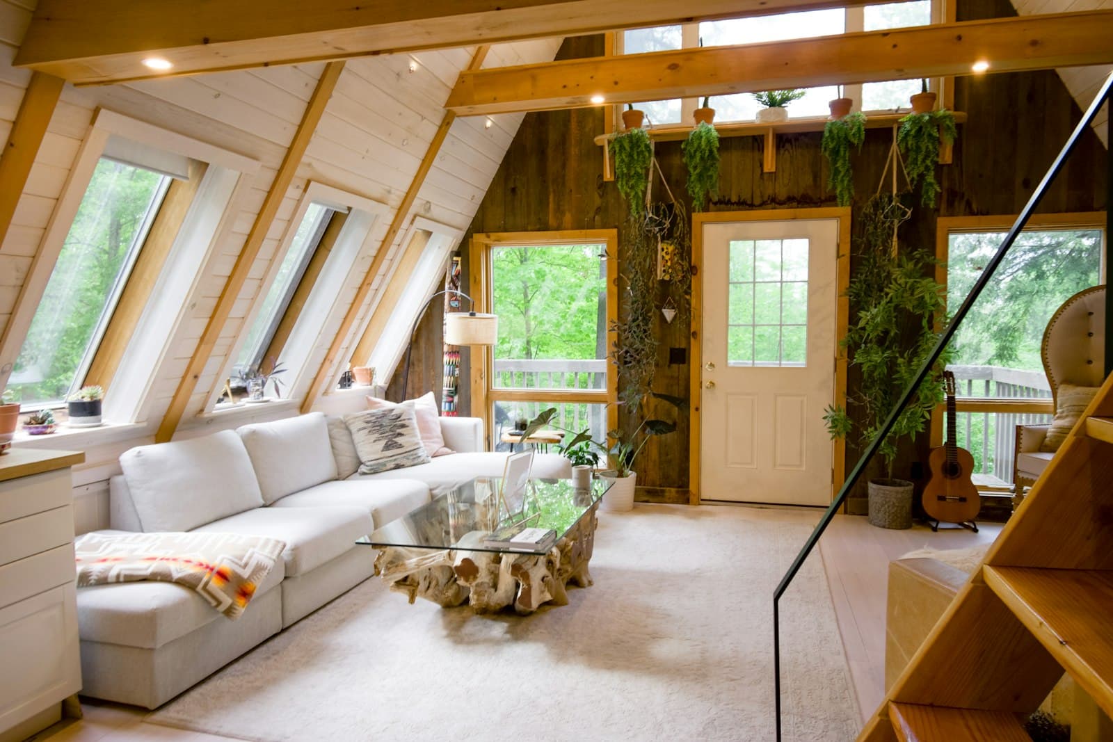 Renovated open living space with exposed beams
